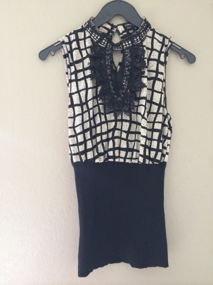 Haut chic noir et beige taille M comme neuf acheter vendre