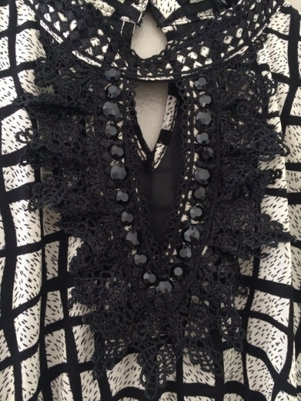 Haut chic noir et beige taille M comme neuf acheter vendre