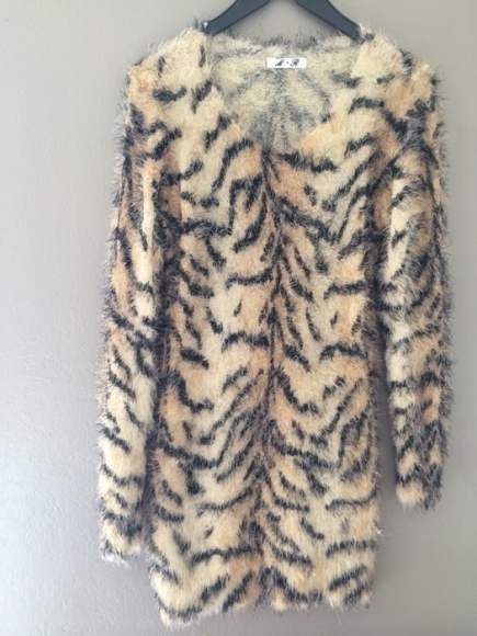 Pull tout doux motif tigré taille unique acheter vendre